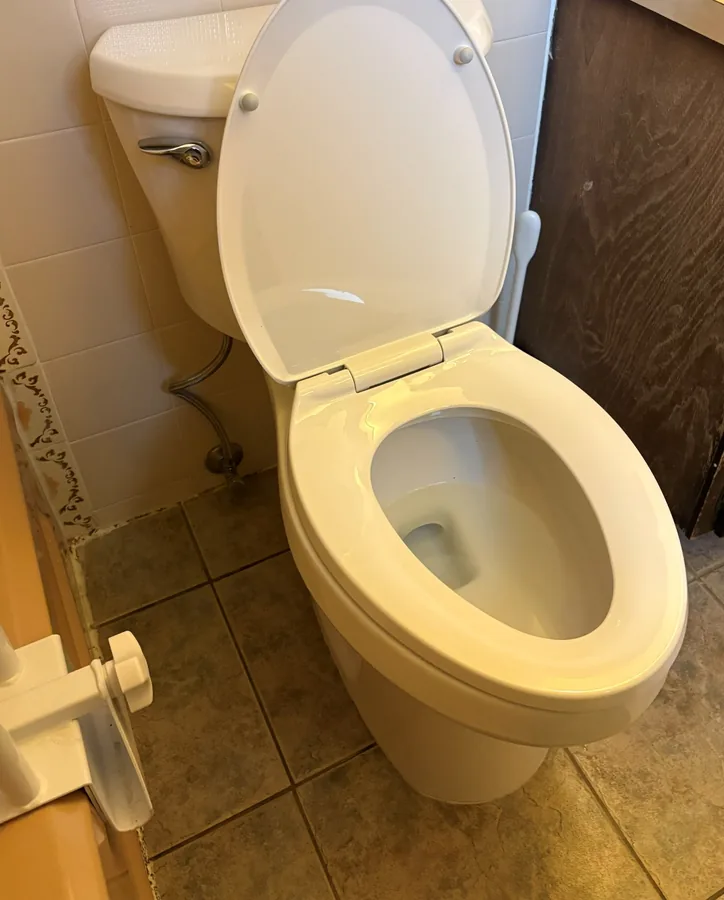 The replacement toilet fitted and finished